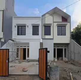 Rumah cantik 2 lantai terima siap huni Bisa KPR Bumi Puspitek Asri