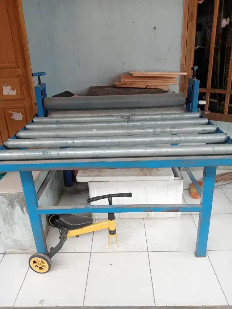 Mesin potong kardus model rolling