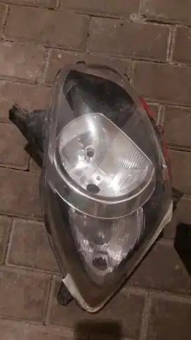 Rumah lampu depan kanan Agya