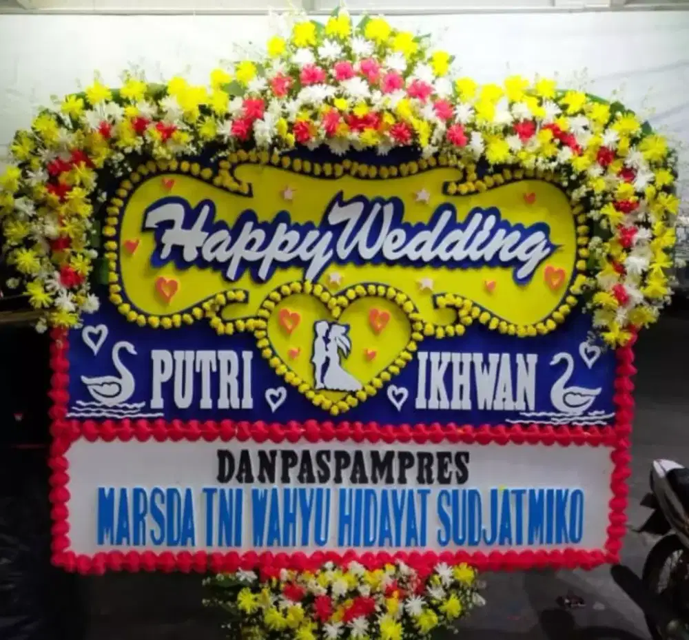 Karangan bunga papan ucapan