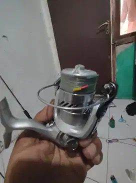 Rell daiwa crosfire 2000