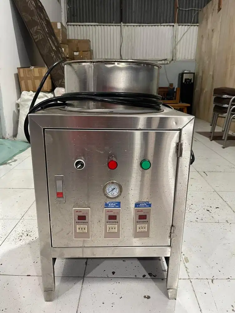 Mesin kupas kulit bawang putih