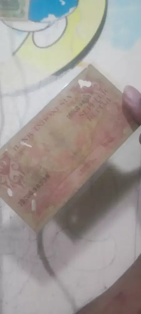 Uang kertas lama, Langka , dua sisi berbeda warna.