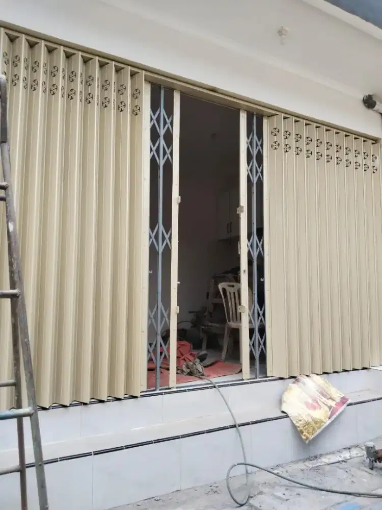 Produsen pintu Harmonika