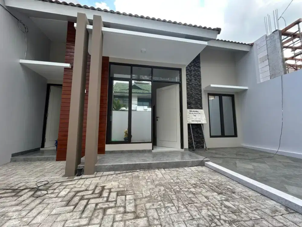 Dijual Rumah Minimalis Modern di Kris Kencana, Dukuh Pakis , Gunung Sari  Surabaya (Bangunan Baru) tanah area belakang masih luas