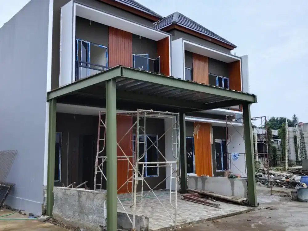 Rumah cluster modern 2lantai pinggir jalan raya jatiwarna,5menit menuju gerbang pintu Tol