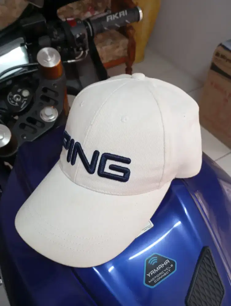 Topi golf logo ping