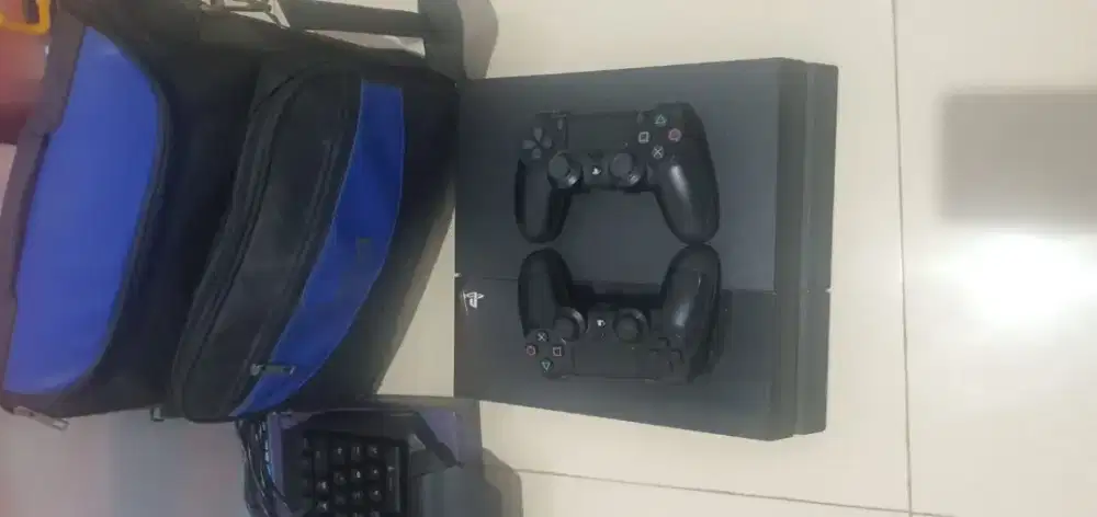 PS 4 Fat 500 GB include 2 stick 10 kaset dan full accesoris