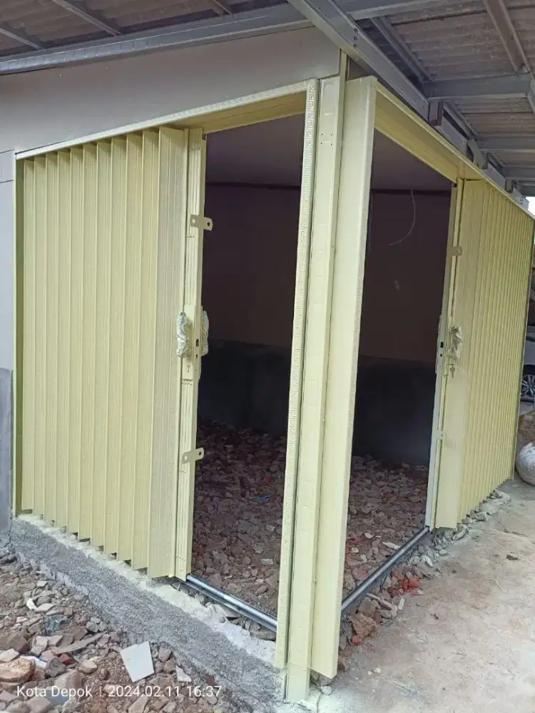 PINTU ROLLING DOOR MANUAL