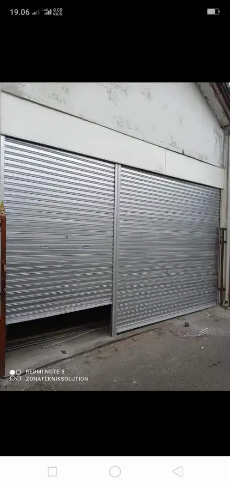 PINTU ROLLING DOOR MANUAL