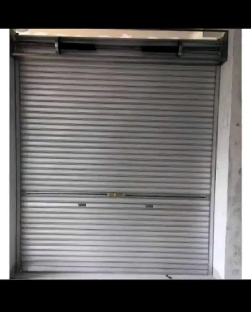 PINTU ROLLING DOOR MANUAL