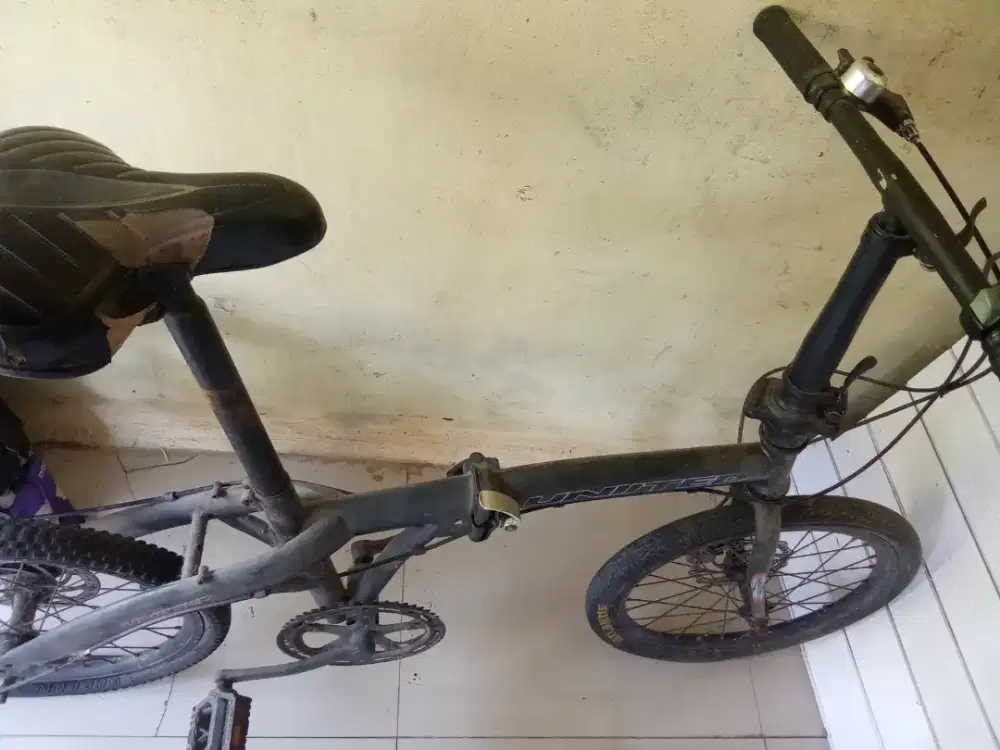 Jual sepeda lipat united harus dibenerin tempat gir belakang,ban 1