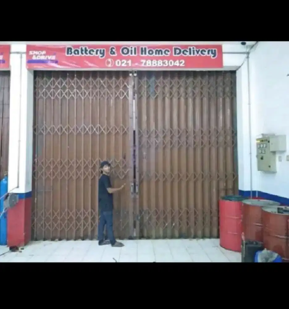 PINTU GARASI ROLLING DOOR MANUAL