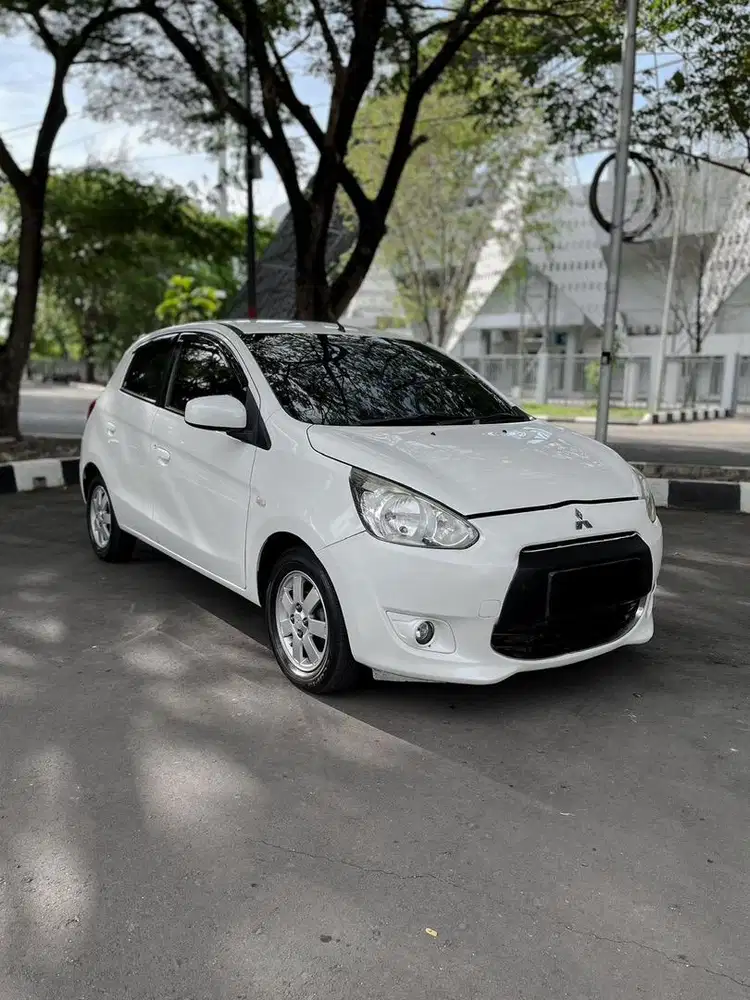 Mitsubishi mirage matic exceed tahun 2012