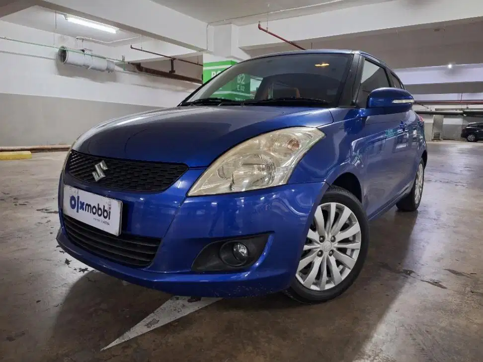LOW DP Suzuki Swift 1.4 GX Bensin-MT 2012 TMR