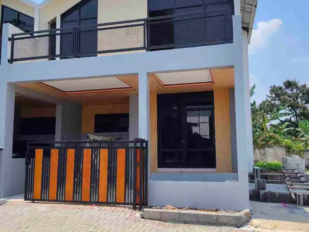 Rumah 1,5 lantai full renovasi all in 500ribu dekat jalan raya