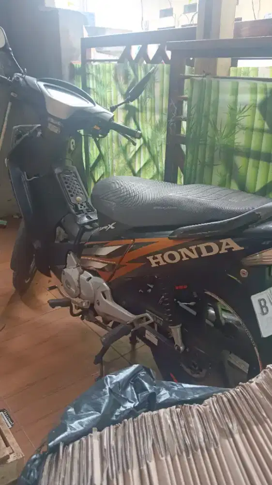 Supra x 125 motor irit dan bandel