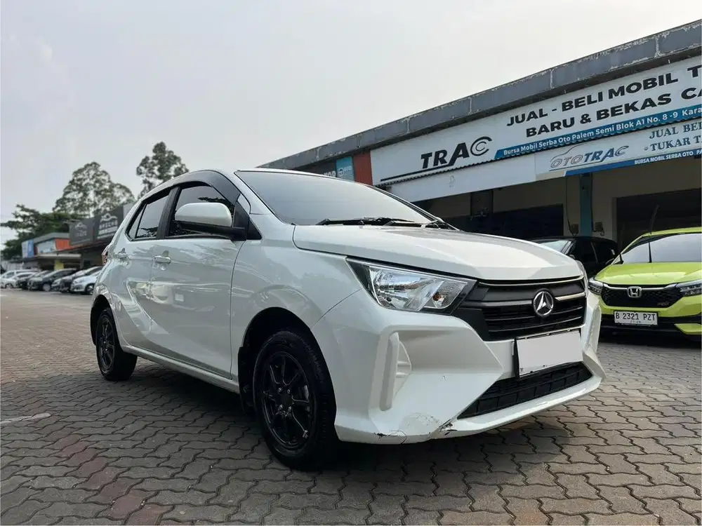 DAIHATSU AYLA 1.0 X 2024 AT PUTIH KM 9RB HARGA CASH PROMO MOBIL TRAWAT