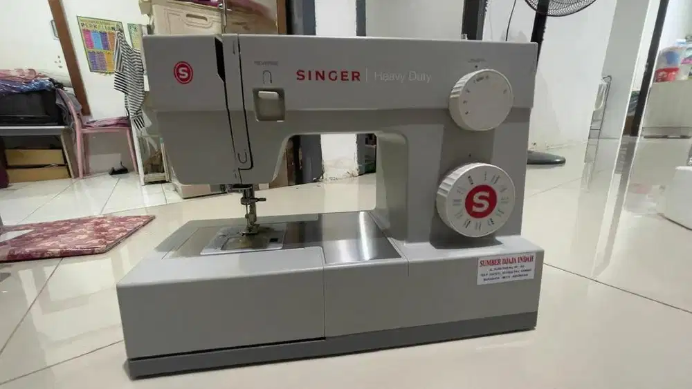 Djual mesin jahit singer portable