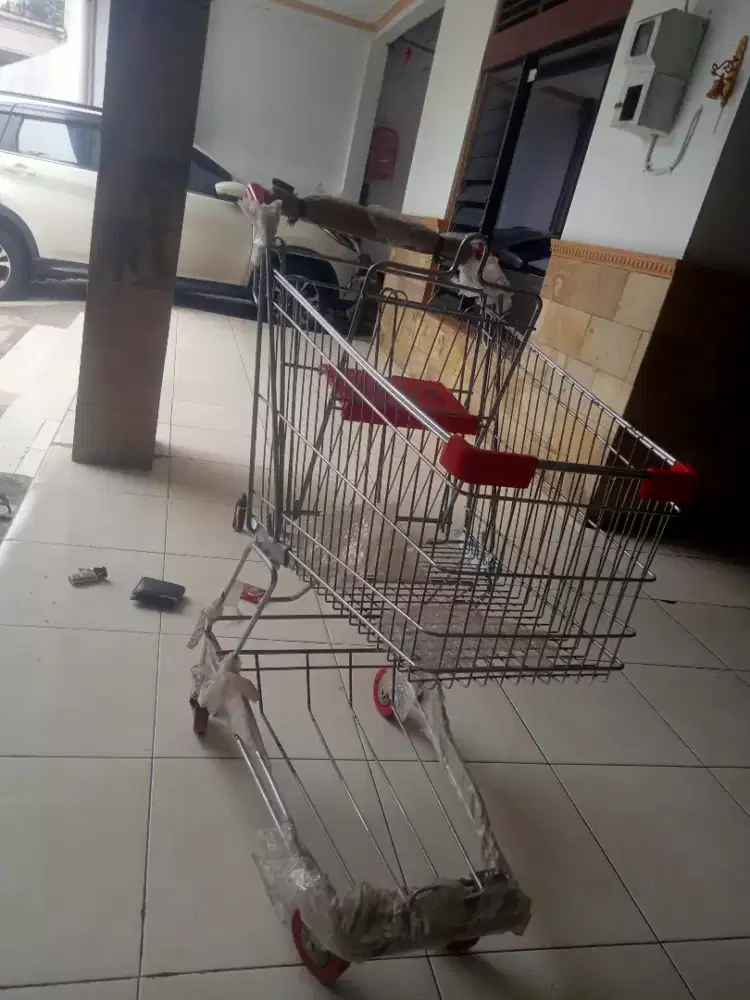 Troli supermarket no burung tanah rumah hp