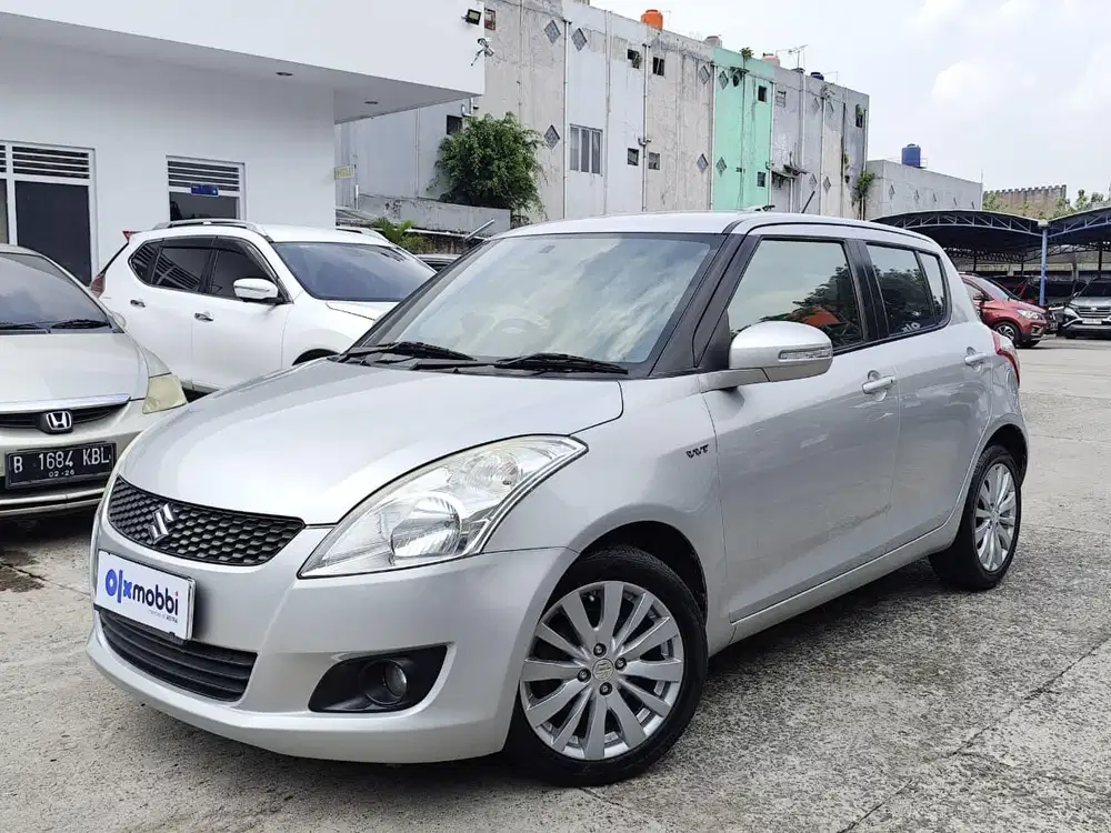 Pajak Panjang - Suzuki Swift 1.4 GX Bensin-MT 2013