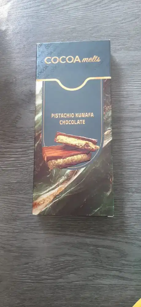 Cocoa melts pistachios kunafa milk chocolate