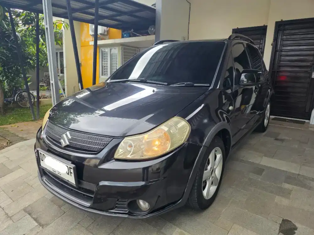 SX4 Xover X OVER 2008 1.5 AT (NIK 2010) Matic Hitam Metalik