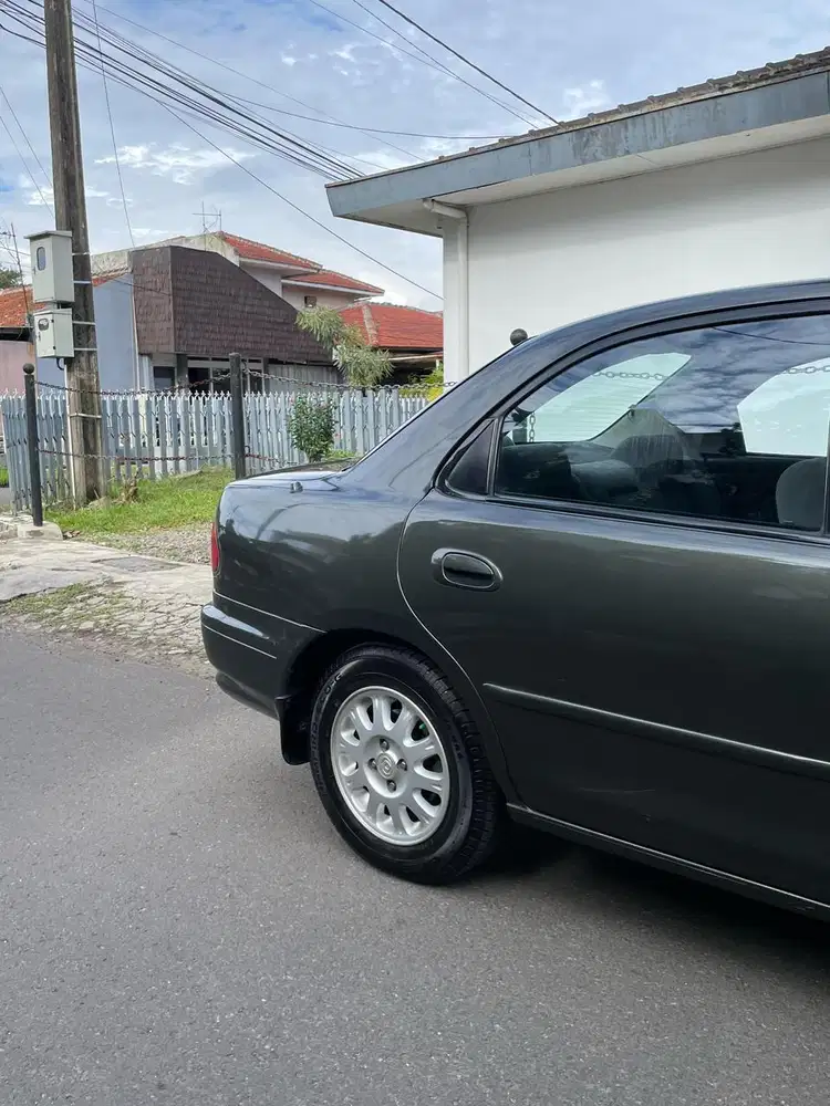 Mazda 323 1998 Bensin