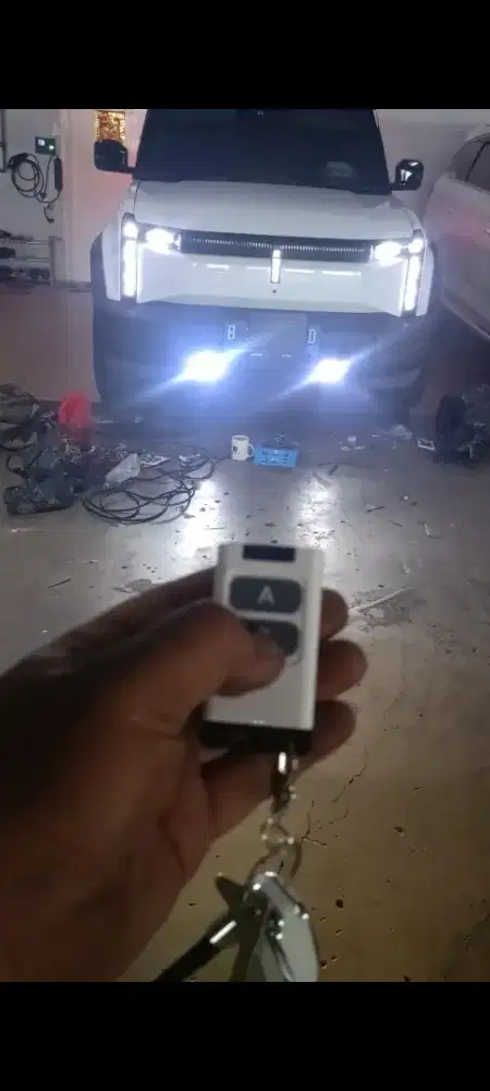 lampu tembak 2 warna mobil listrik SM pasang dtmpt anda