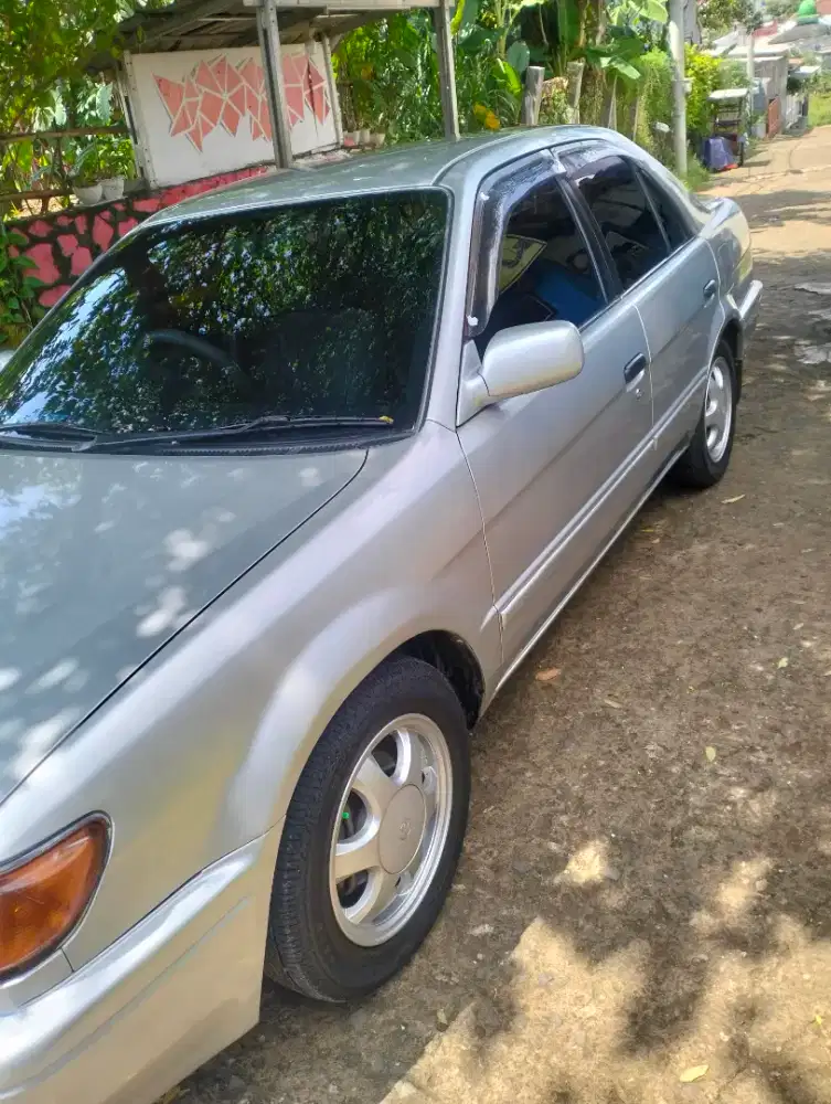 Kendaraan sedan Soluna th 2000