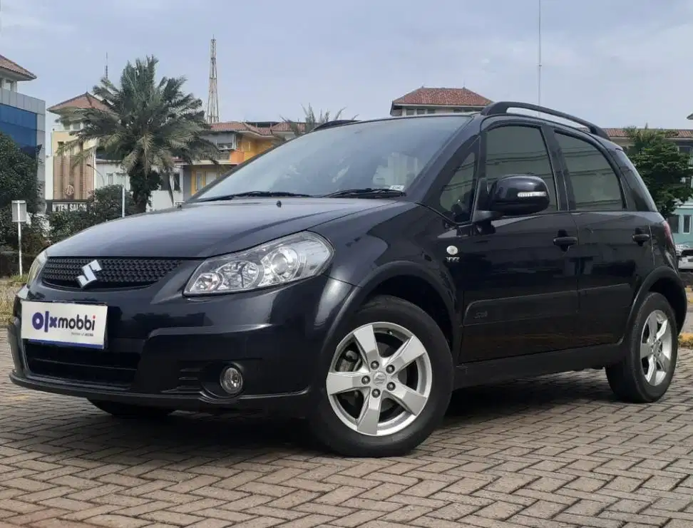 TDP 4,JT Suzuki SX4 1.5 X-Over Bensin-MT Hitam 2011
