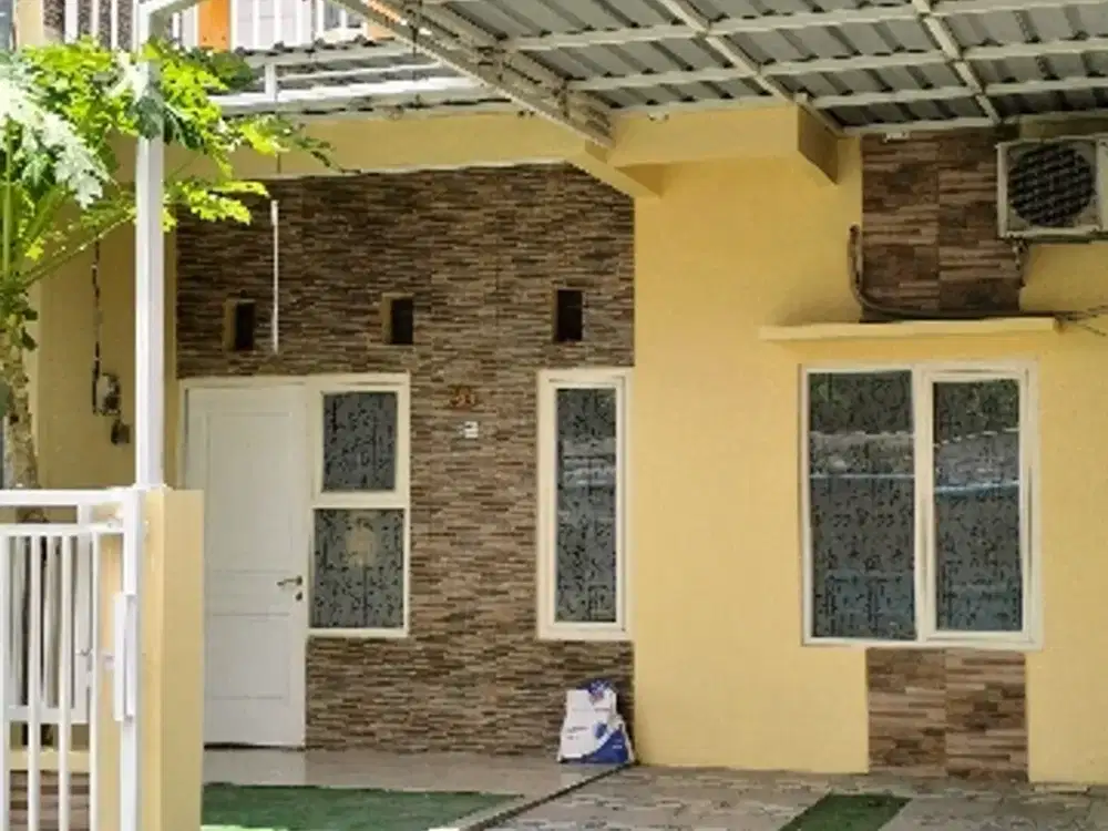 Rumah cantik 2 lantai luas Wiguna DP nol