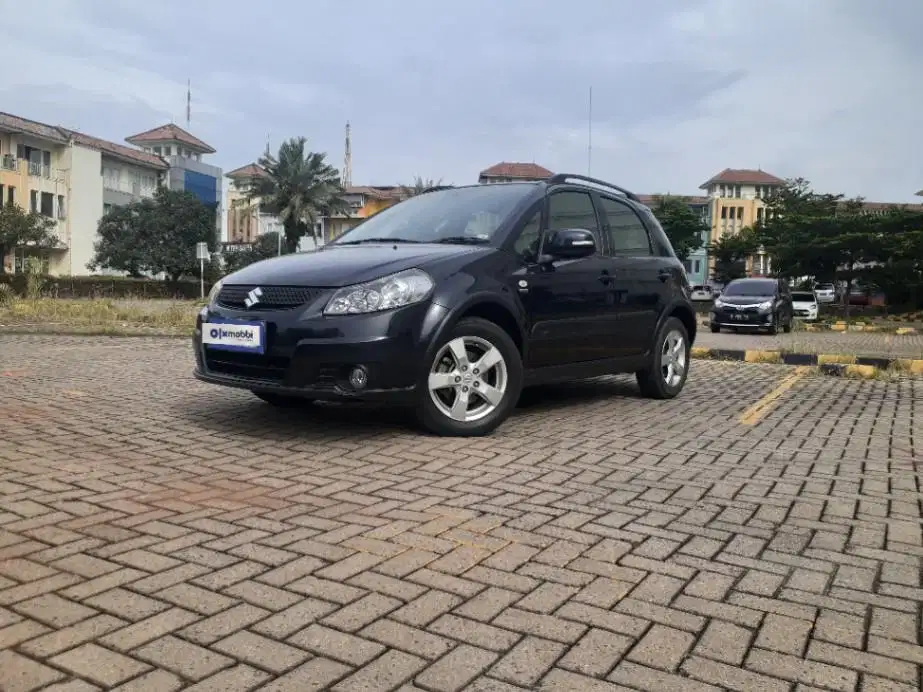 TDP 4,JT Suzuki SX4 1.5 X-Over Bensin-MT Hitam 2011
