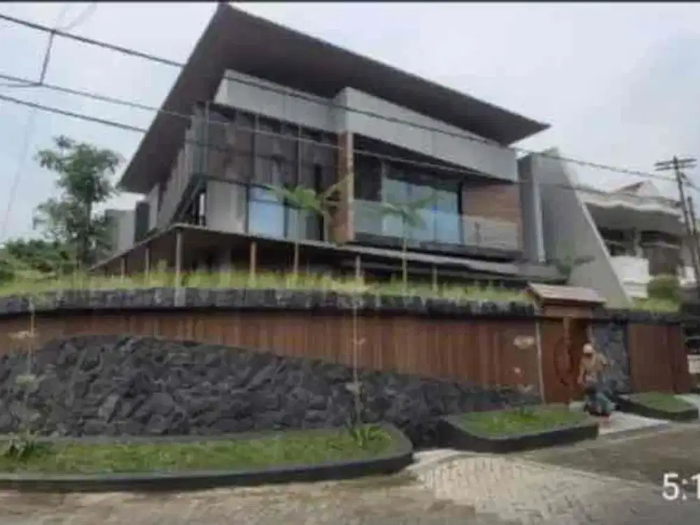New Tropical House With Waterfall Manyar Kertoadi