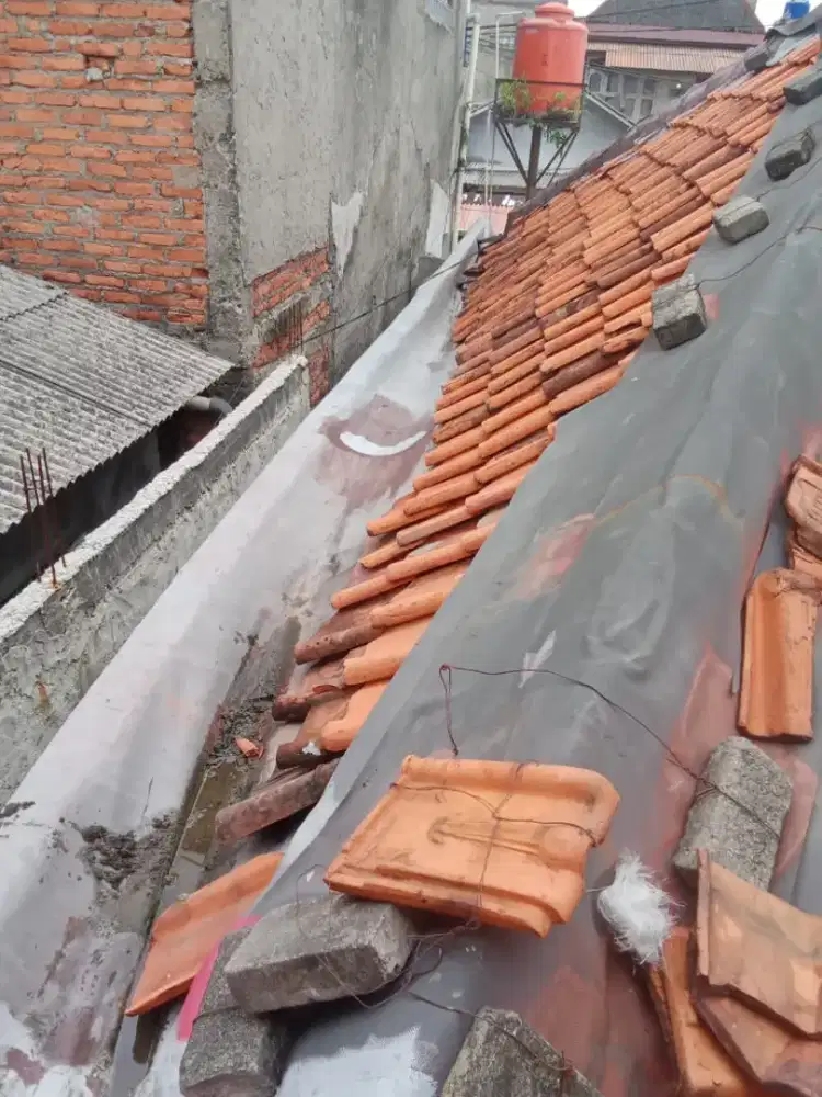 Tukang bangunan,perbaikan atap bocor,dag,talang,kanopi ,renopasi dll