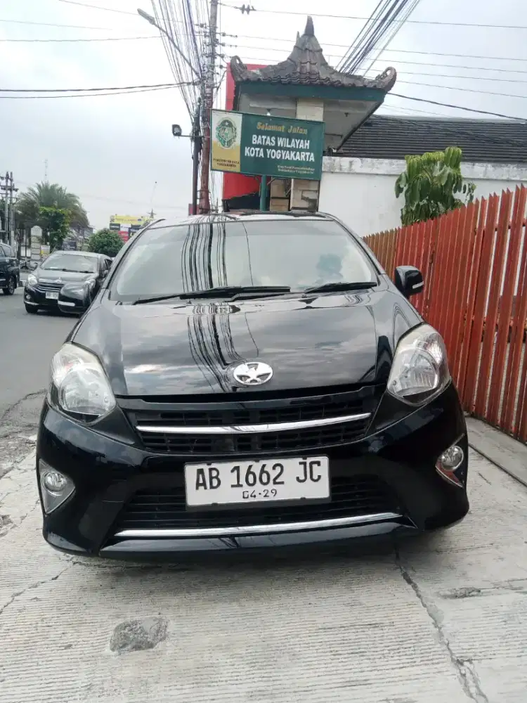 Agya 2014 plat AB tgn1