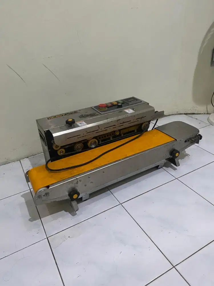 Heavypack mesin continous sealer otomatis