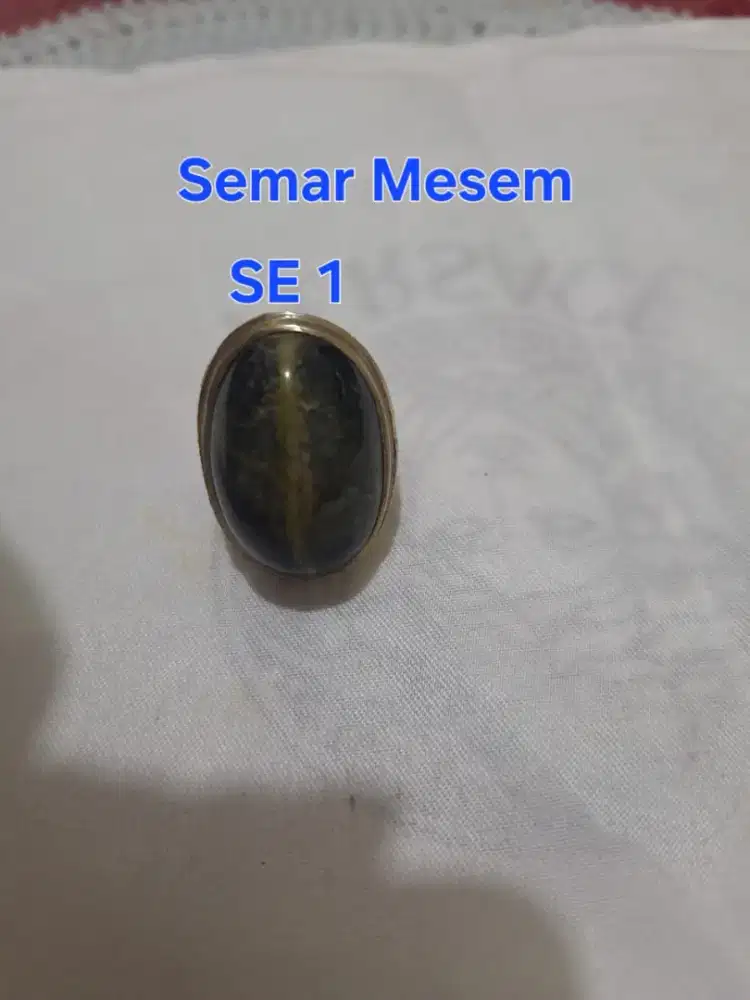 Batu cincin tapak jalak 
Hitam garis perak 
Se 1 cincin laki laki 
Rin
