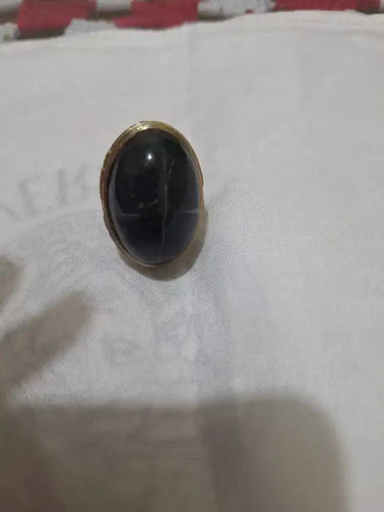 Batu cincin tapak jalak 
Hitam garis perak 
Se 4 cincin laki laki 
Rin