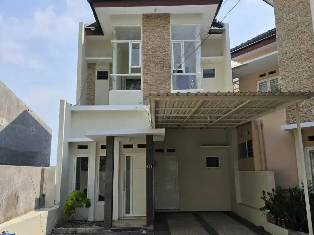 RUMAH MINIMALIS DUA LANTAI SAXSOFON MALANG
