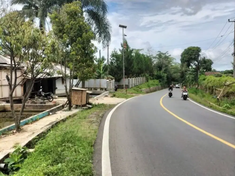 Dijual tanah kebun durian pinggir Jl. Raya Nasional, SHM, 6,7 Ha