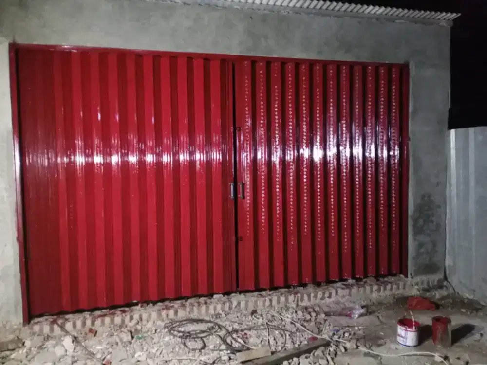 Rolling door folding gate