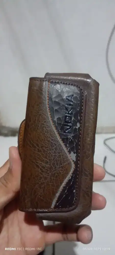 Jual dompet /sarung hp atau lain nya kondisi baru stok lama minat pm