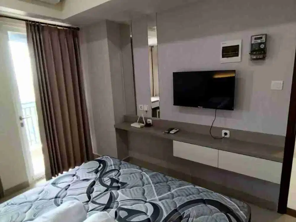 Rent apartment grand dharmahusada lagoon type studio unit bagus