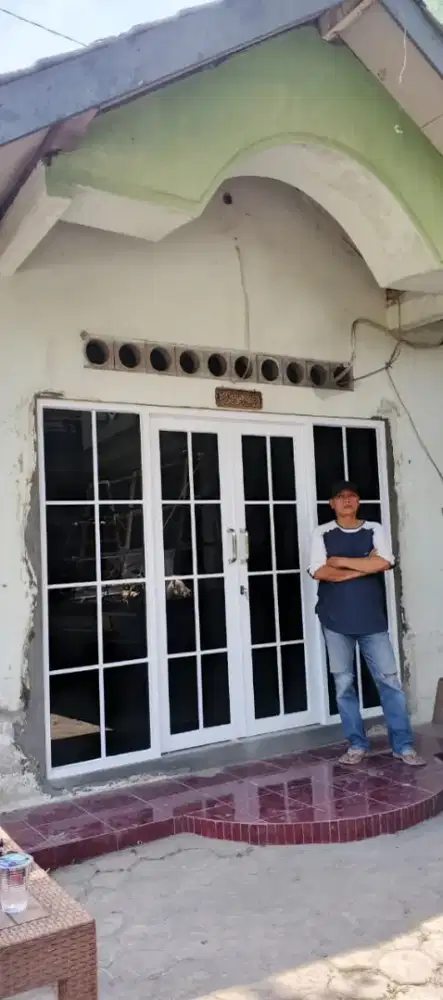 Tukang kaca/alumunium/partisi