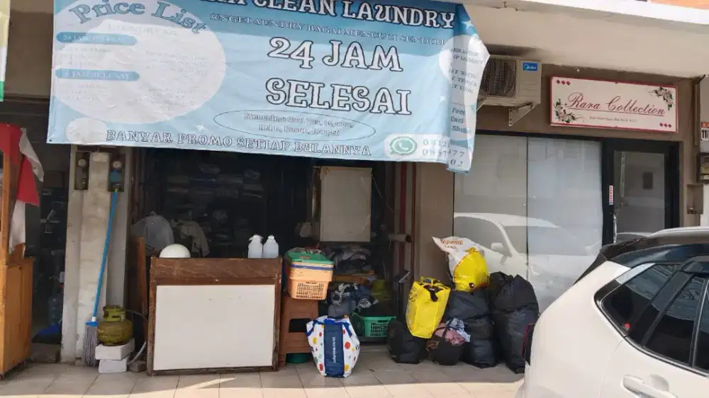 Operator Setrika Laundry