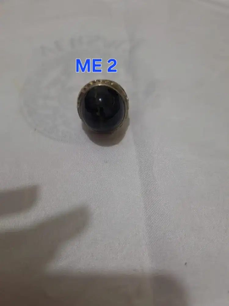 Batu cincin tapak jalak 
Hitam garis perak 
Me 2 cincin laki laki 
Rin