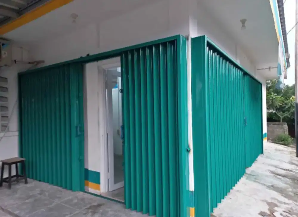 Folding gate rolling door