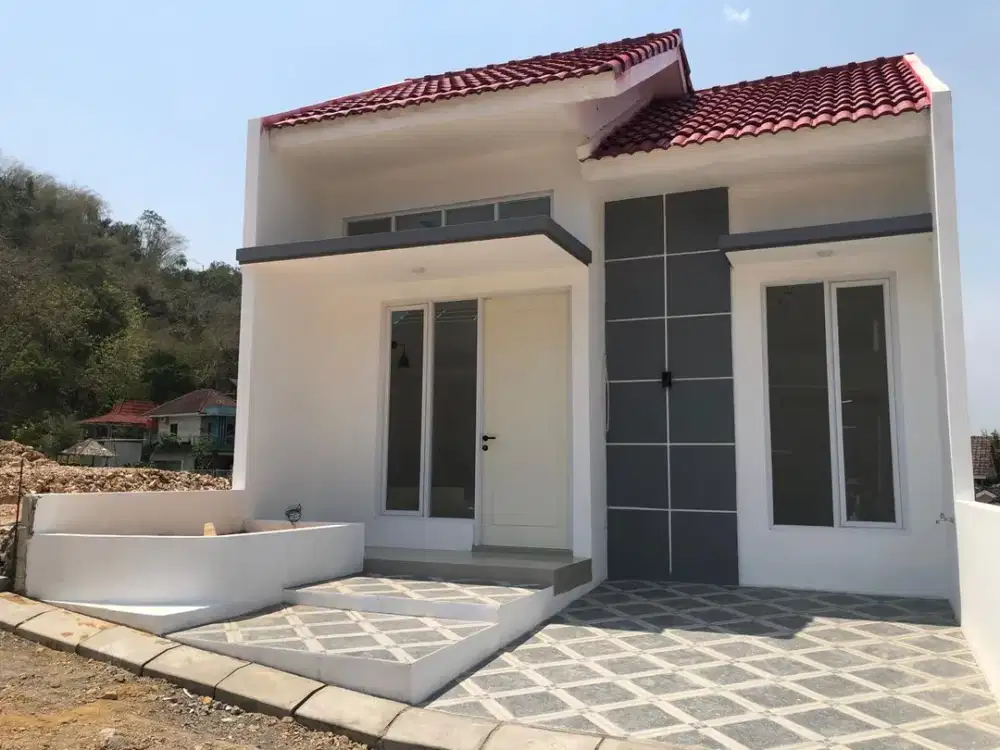 RUMAH MODERN DALAM PERUMAHAN STRATEGIS DEKAT PASAR GODEAN