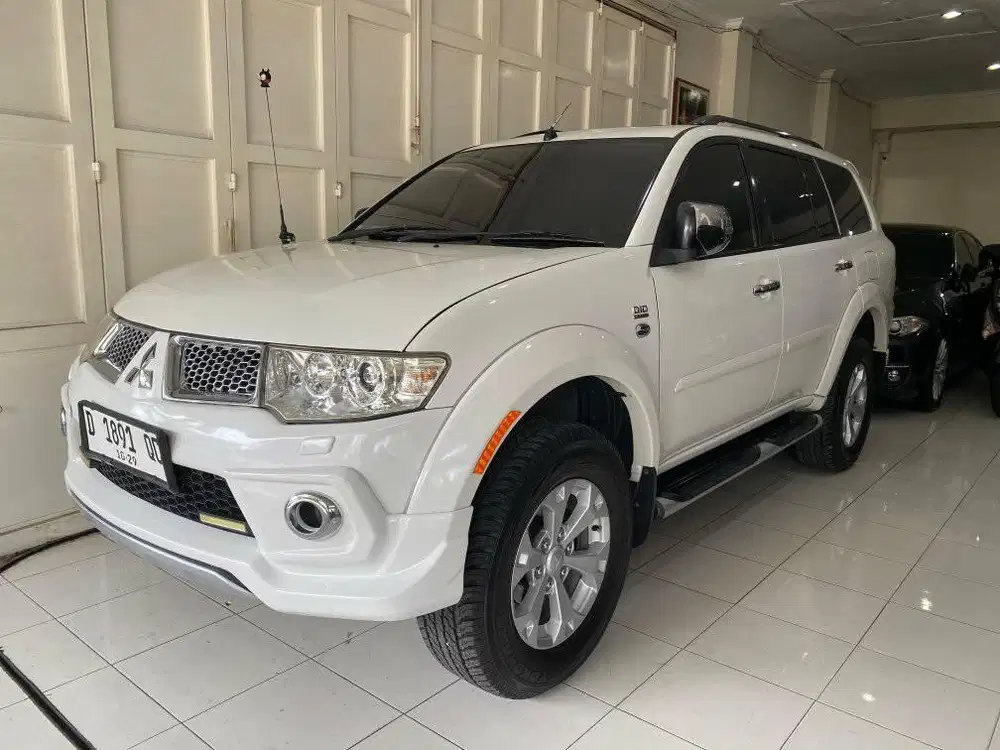 Pajero Sport Dakar Limited Diesel 2.5 A/T 2013 Mitsubishi Solar Low KM